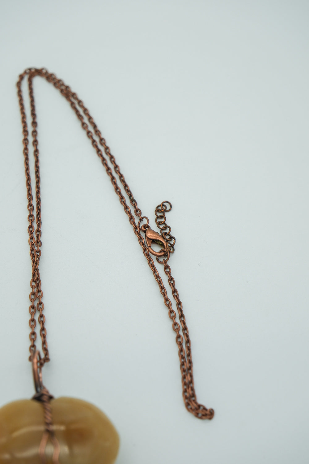 Copper chain necklace on a white background